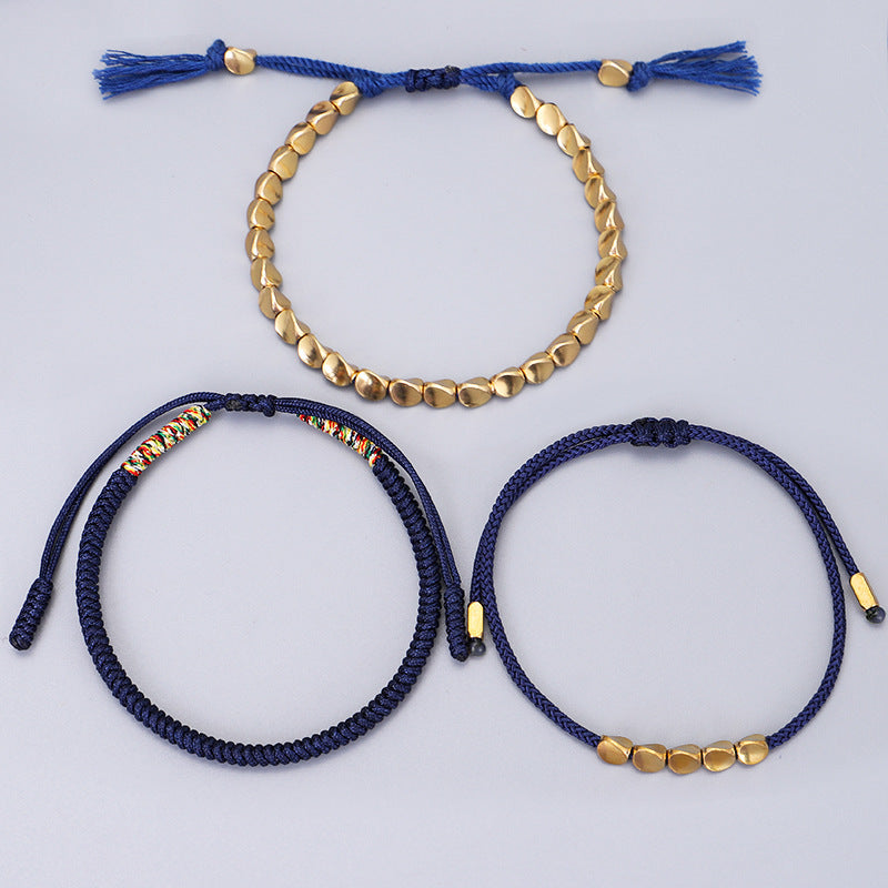 Geflochtenes Armband mit goldenen Perlen – Unisex